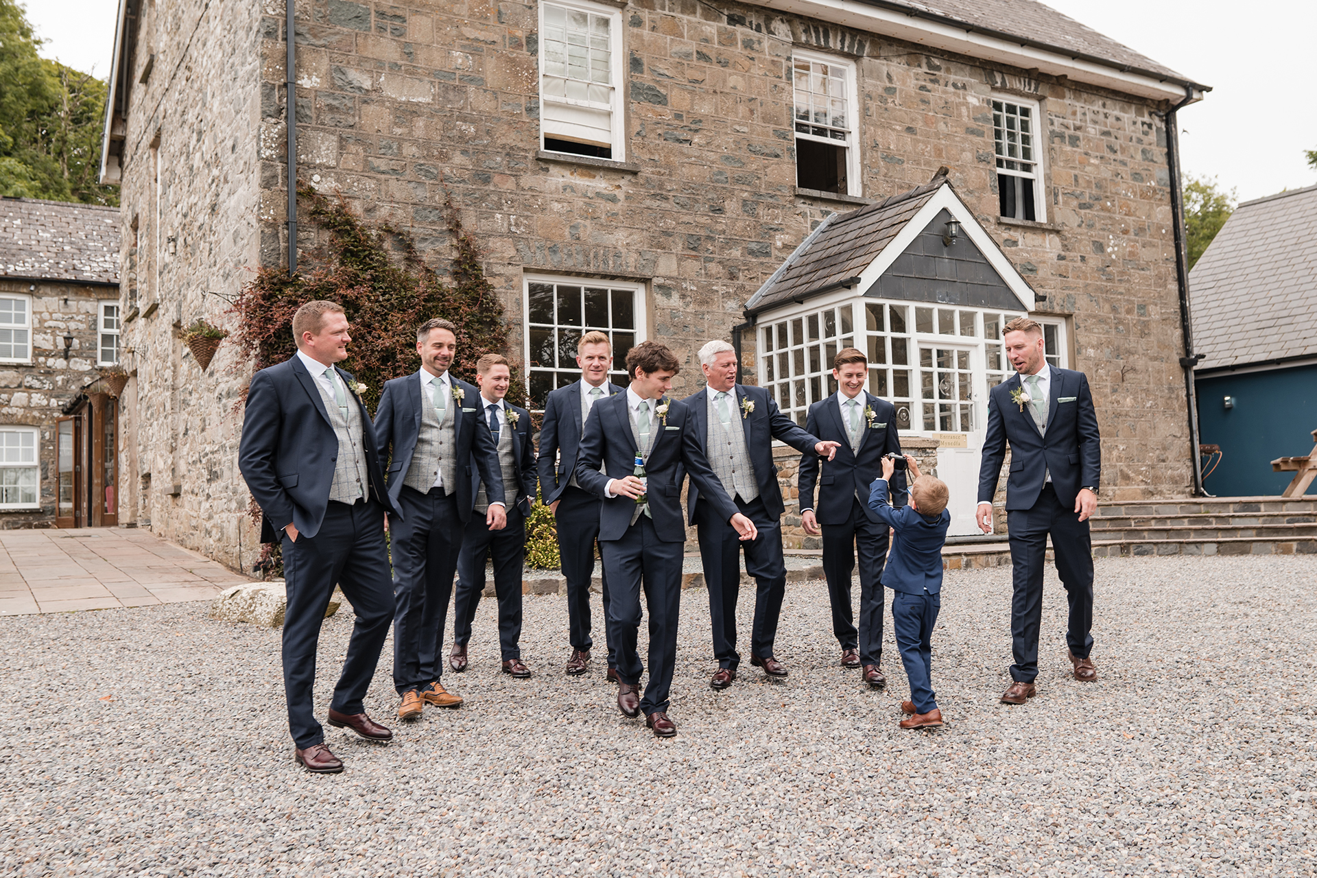 men in suits at Woodland wedding wales